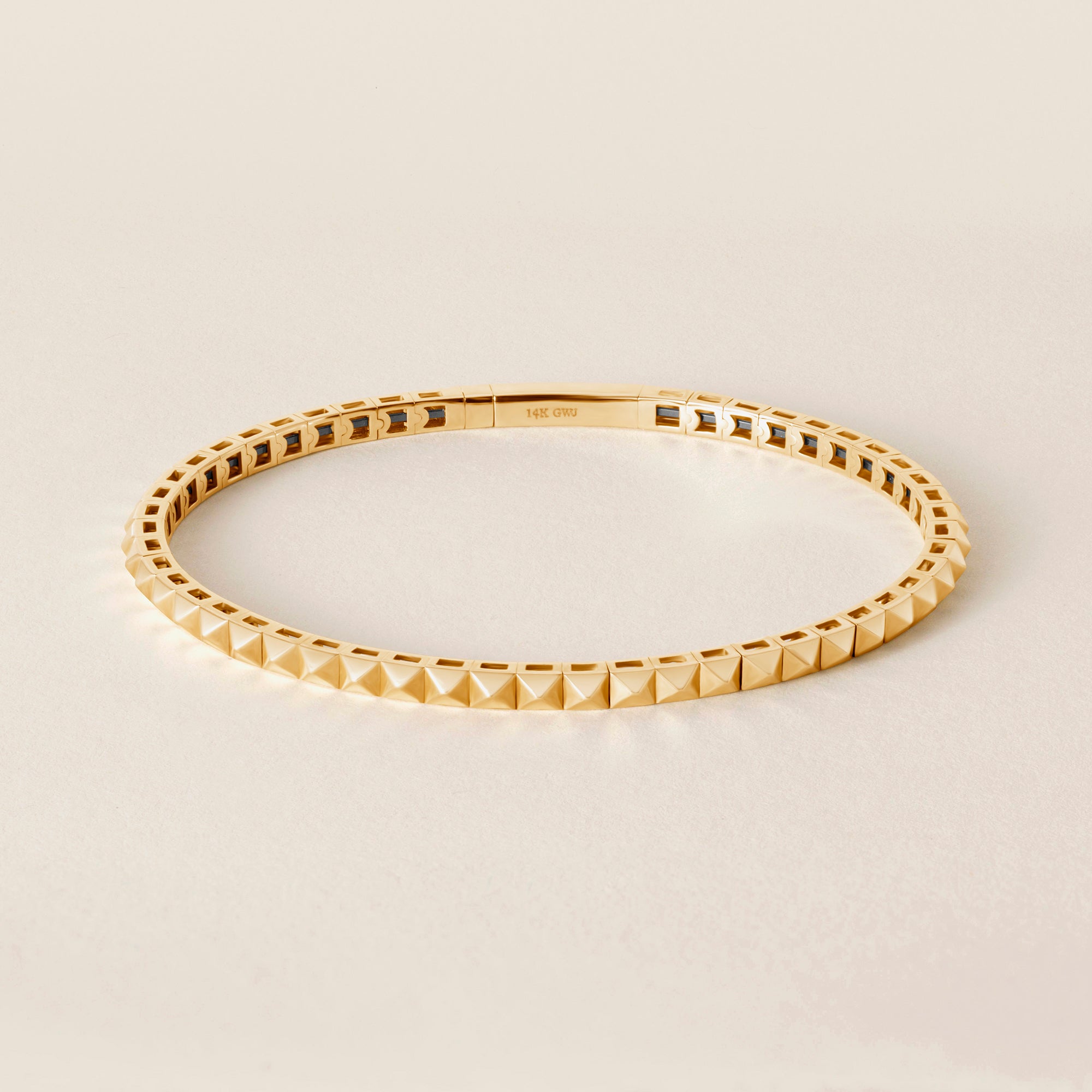Elegant Gold Pyramid Stud Bangle